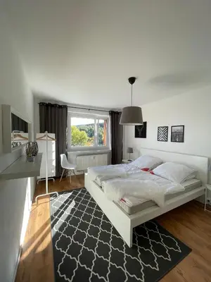 Ein Bett oder Betten in einem Zimmer der Unterkunft FeWo Oberwiesenthal