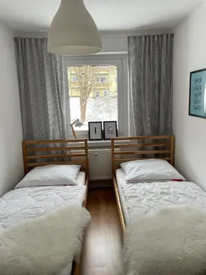 Ein Bett oder Betten in einem Zimmer der Unterkunft FeWo Oberwiesenthal