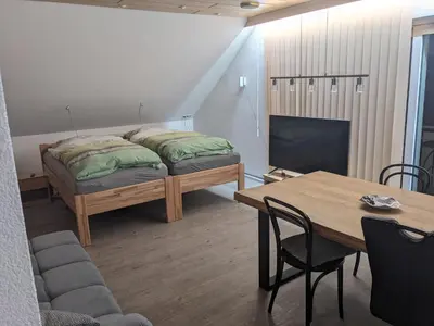 Ein Bett oder Betten in einem Zimmer der Unterkunft Ferienwohnung Lang