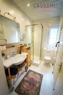 Ein Badezimmer in der Unterkunft CROSSHILL Appartements - Charmante und helle Wohnung
