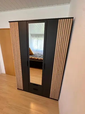 Ein Bett oder Betten in einem Zimmer der Unterkunft Gemütliches Appartement - WBS