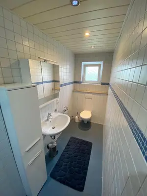 Ein Badezimmer in der Unterkunft Gemütliches Appartement - WBS