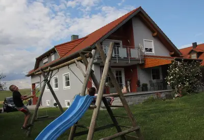 Ein Kinderspielbereich in der Unterkunft Ferienwohnung Leibl