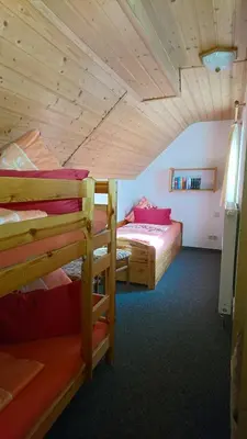 Ein Bett oder Betten in einem Zimmer der Unterkunft Ferienhaus Bauer