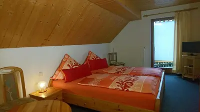 Ein Bett oder Betten in einem Zimmer der Unterkunft Ferienhaus Bauer