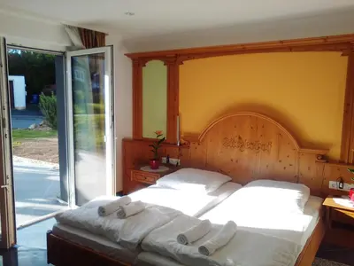 Ein Bett oder Betten in einem Zimmer der Unterkunft Ferienwohnung Harmonie