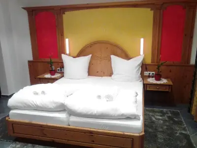 Ein Bett oder Betten in einem Zimmer der Unterkunft Ferienwohnung Harmonie