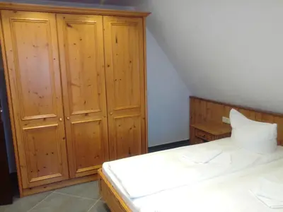 Ein Bett oder Betten in einem Zimmer der Unterkunft Ferienwohnung Harmonie