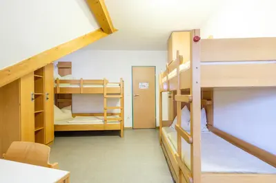 Ein Bett oder Betten in einem Zimmer der Unterkunft Jugendherberge Burg Trausnitz