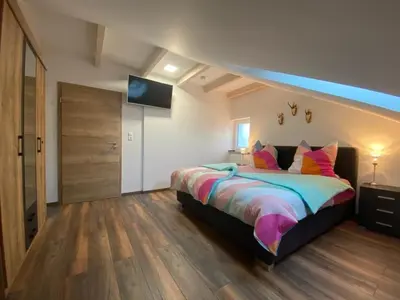 Ein Bett oder Betten in einem Zimmer der Unterkunft Fichtelherz Studio DG - a47179