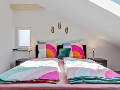Ein Bett oder Betten in einem Zimmer der Unterkunft Fichtelherz Studio DG - a47179