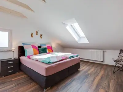 Ein Bett oder Betten in einem Zimmer der Unterkunft Fichtelherz Studio DG - a47179