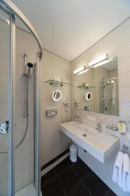 Ein Badezimmer in der Unterkunft Akzent Hotel Goldner Stern