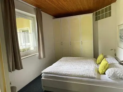 Ein Bett oder Betten in einem Zimmer der Unterkunft Hotel Barbara