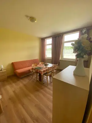 Ein Sitzbereich in der Unterkunft Ferienwohnung Goldener Drache