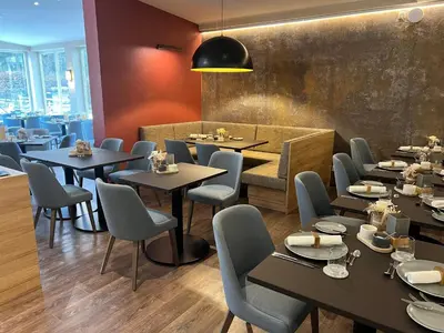 Ein Sitzbereich in der Unterkunft Hotel Stempferhof