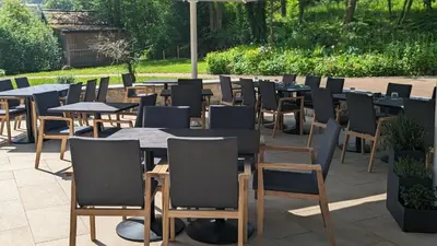 Ein Garten an der Unterkunft Hotel Stempferhof