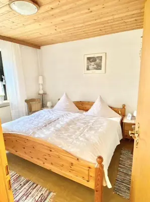 Ein Bett oder Betten in einem Zimmer der Unterkunft Ferienwohnungen Anna Altmann
