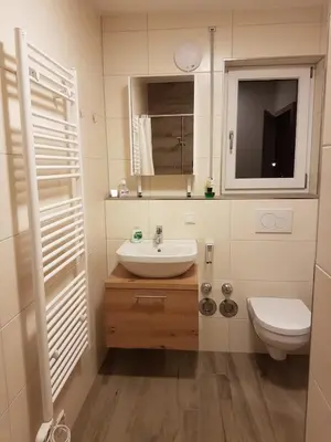 Ein Badezimmer in der Unterkunft Casa Lago Ferienappartements Steinberg am See