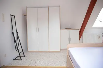 Ein Bett oder Betten in einem Zimmer der Unterkunft Ferienwohnungen Riedel