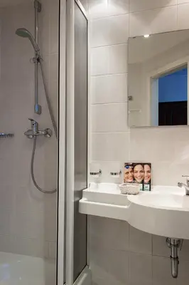 Ein Badezimmer in der Unterkunft Landhotel Alt-Jocketa