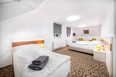 Ein Bett oder Betten in einem Zimmer der Unterkunft Pension Delicato