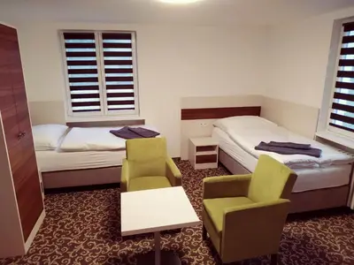 Ein Bett oder Betten in einem Zimmer der Unterkunft Pension Delicato