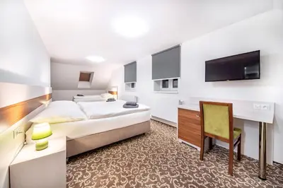 Ein Bett oder Betten in einem Zimmer der Unterkunft Pension Delicato