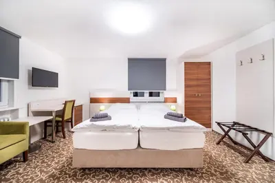 Ein Bett oder Betten in einem Zimmer der Unterkunft Pension Delicato
