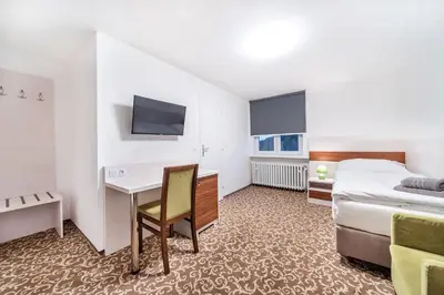 Ein Bett oder Betten in einem Zimmer der Unterkunft Pension Delicato
