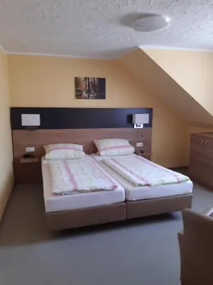 Ein Bett oder Betten in einem Zimmer der Unterkunft Landpension Heidi Machold