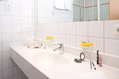 Ein Badezimmer in der Unterkunft Behringers Freizeit - und Tagungshotel