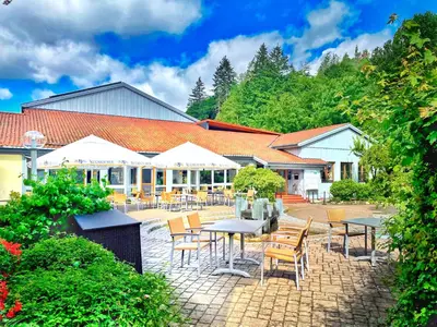 Ein Restaurant oder anderes Speiselokal in der Unterkunft WAGNERS Hotel im Frankenwald