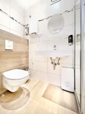 Ein Badezimmer in der Unterkunft WAGNERS Hotel im Frankenwald