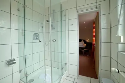 Ein Badezimmer in der Unterkunft Hotel Zrenners GARNI