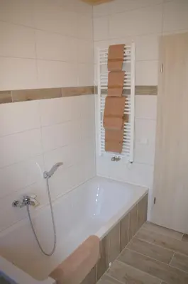 Ein Badezimmer in der Unterkunft Frankenhaus