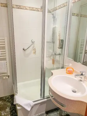 Ein Badezimmer in der Unterkunft Landhotel Bauernschmitt