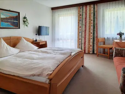 Ein Bett oder Betten in einem Zimmer der Unterkunft Café-Pension Krems