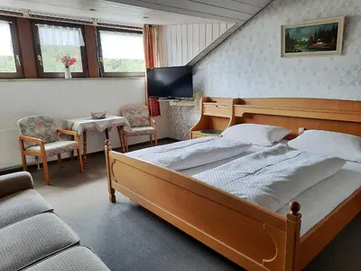 Ein Bett oder Betten in einem Zimmer der Unterkunft Café-Pension Krems