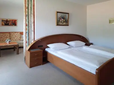 Ein Bett oder Betten in einem Zimmer der Unterkunft Café-Pension Krems
