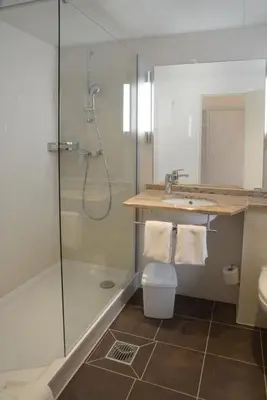 Ein Badezimmer in der Unterkunft Hotel Kaiseralm
