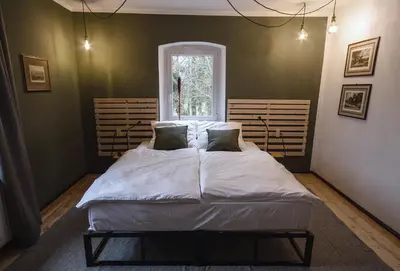 Ein Bett oder Betten in einem Zimmer der Unterkunft Zum G'Leut
