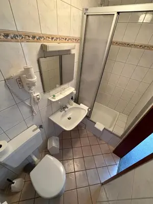 Ein Badezimmer in der Unterkunft Pension & Metzgerei Friedrich
