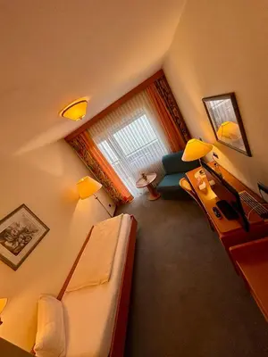 Ein Bett oder Betten in einem Zimmer der Unterkunft Pension & Metzgerei Friedrich