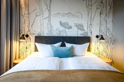 Ein Bett oder Betten in einem Zimmer der Unterkunft Elldus Resort