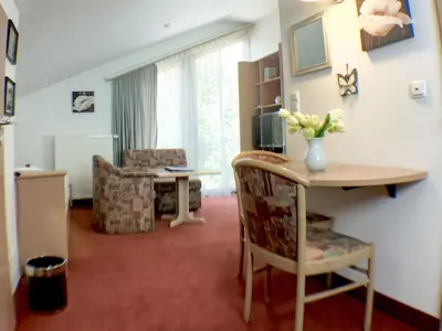 Ein Sitzbereich in der Unterkunft Appartement-Hotel Sibyllenbad