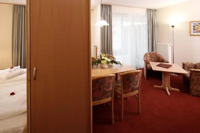 Ein Sitzbereich in der Unterkunft Appartement-Hotel Sibyllenbad