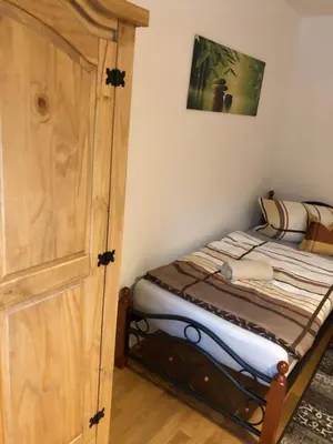 Ein Bett oder Betten in einem Zimmer der Unterkunft Ferienwohnung Tom
