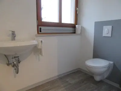 Ein Badezimmer in der Unterkunft Pension Jägerschenke