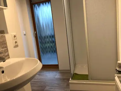 Ein Badezimmer in der Unterkunft Pension Jägerschenke